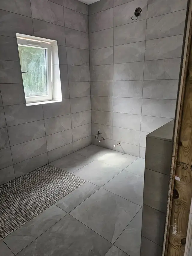 Bathroom tiling in Swansea: grey wetroom