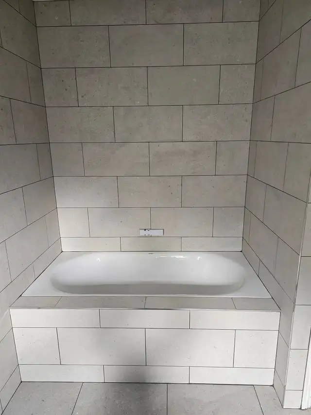 Bathroom tiling in Swansea: white brick effect