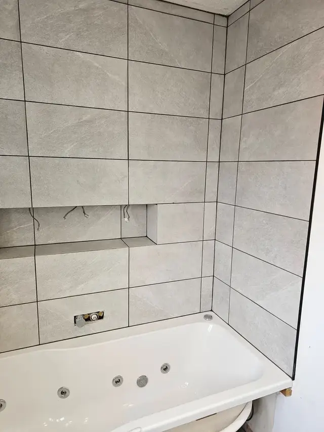 Bathroom tiling in Swansea: grey full top