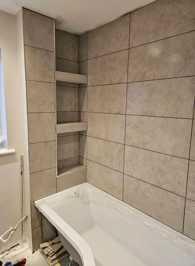 Bathroom tiling in Swansea: brown grey shelves