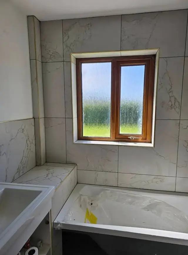 Bathroom tiling in Swansea: grey boxes window