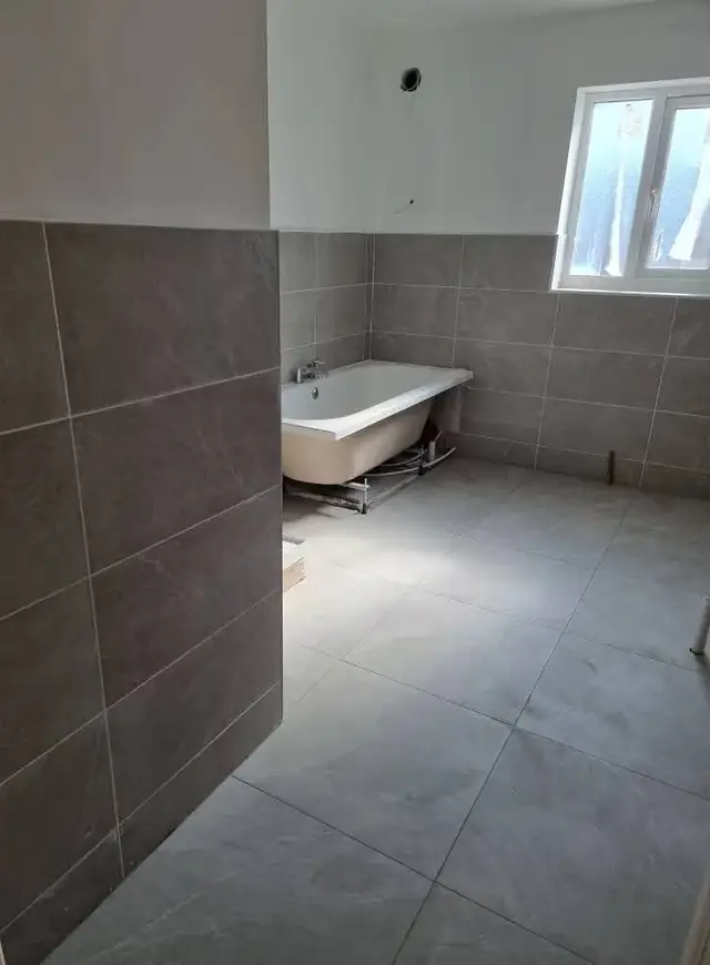 Bathroom tiling in Swansea: grey