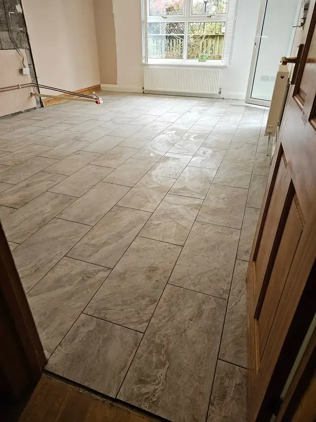Floor tiling in Swansea: grey brickeffect