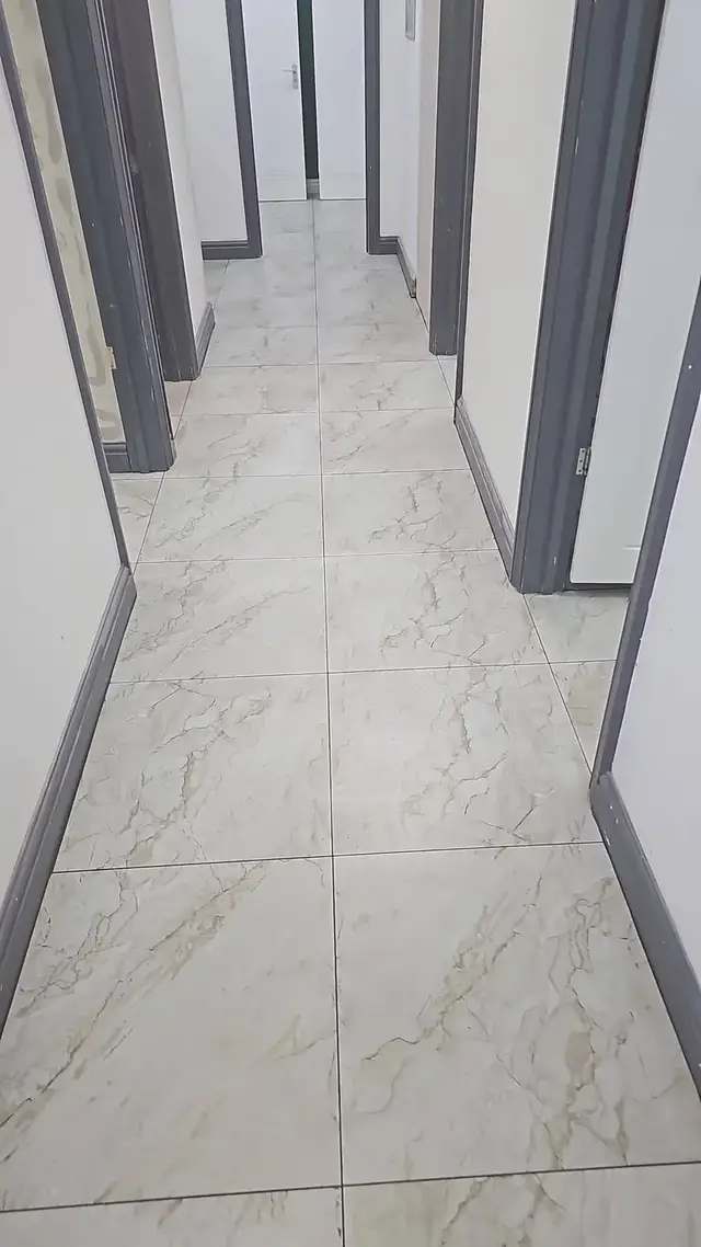 Floor tiling in Swansea: white hallway