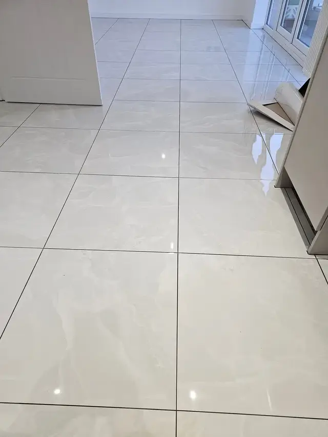 Floor tiling in Swansea: white floor tiles2