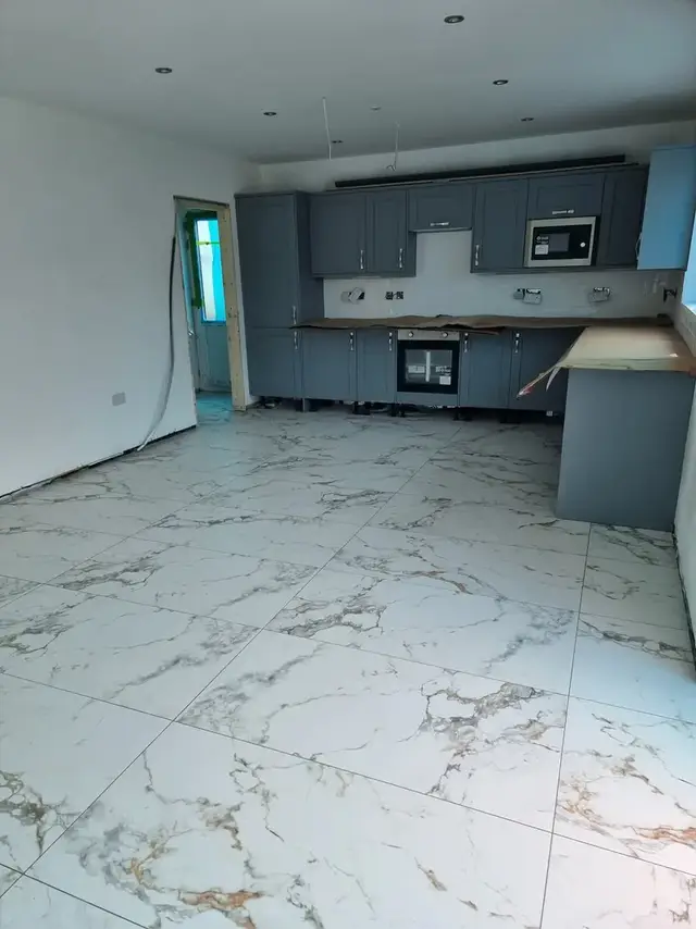 Floor tiling in Swansea: white kitchen floor
