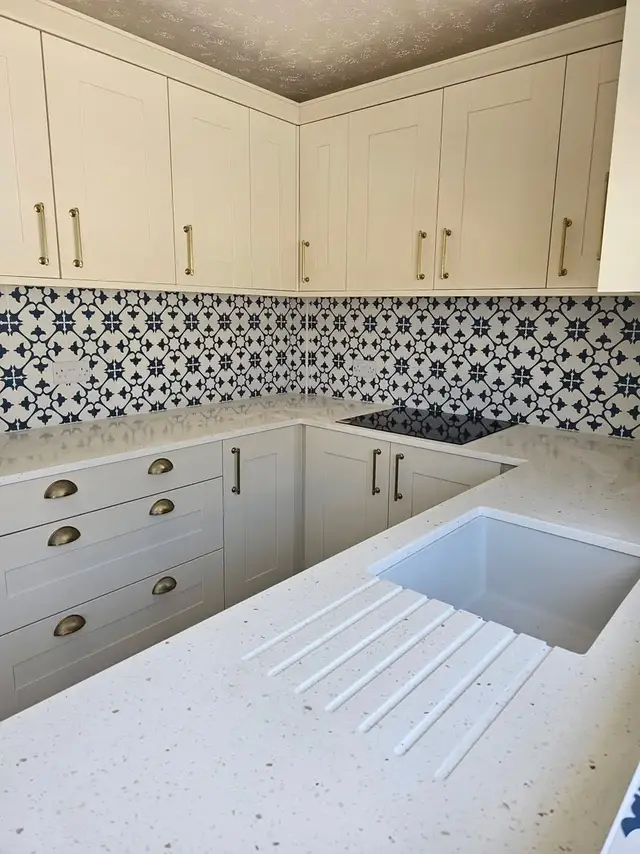 Kitchen tiling in Swansea: white blue pattern